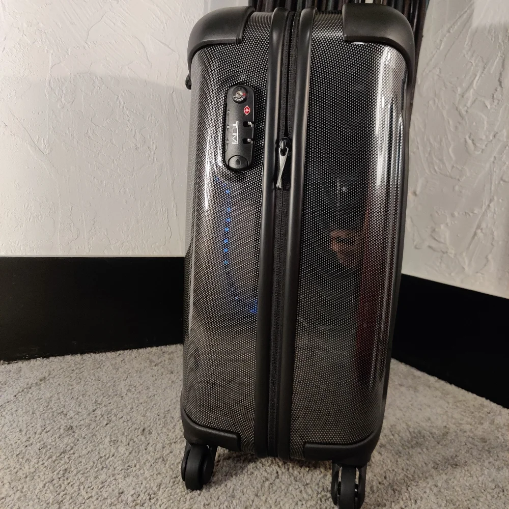 Tumi •upgrade your